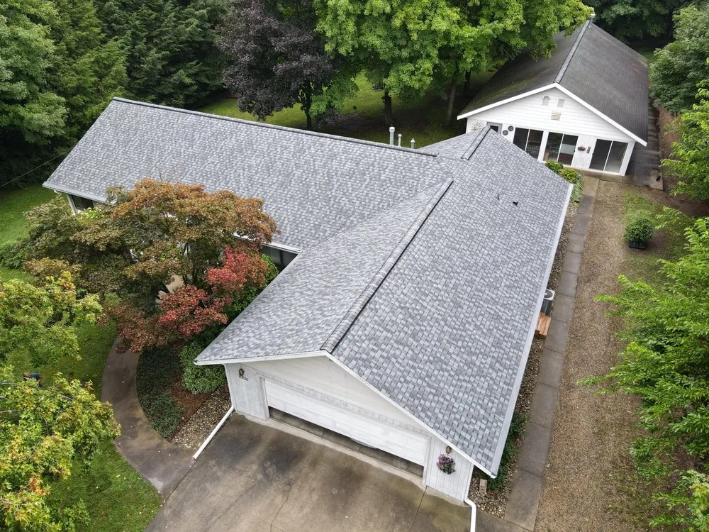 Slide of Dennison Roofing & Gutter Toppers