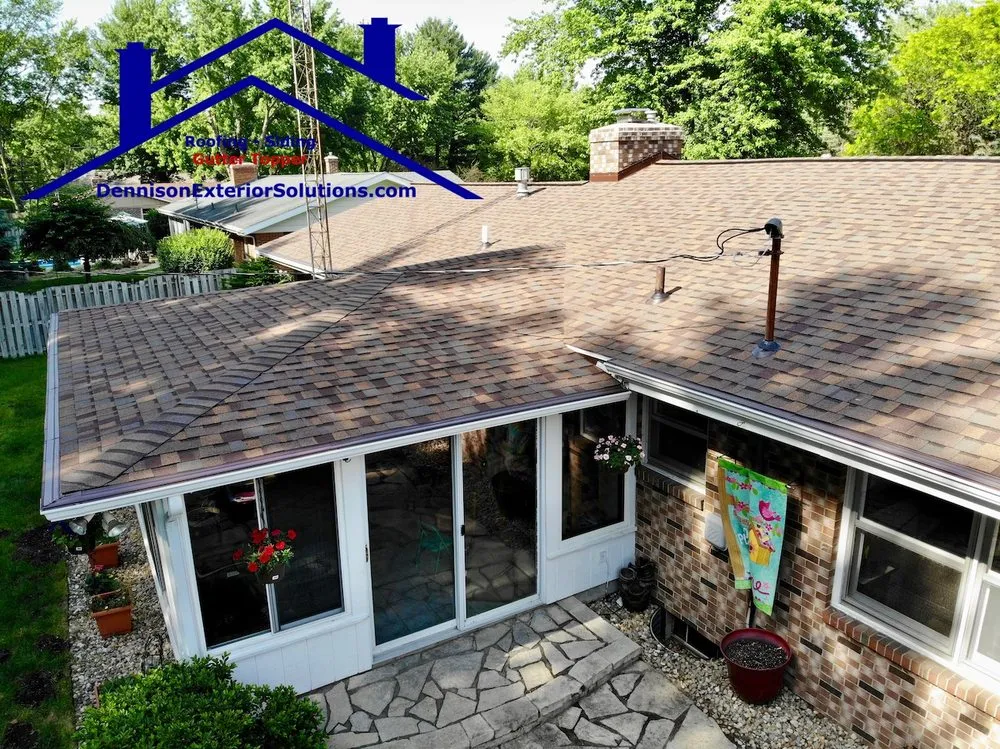 Slide of Dennison Roofing & Gutter Toppers