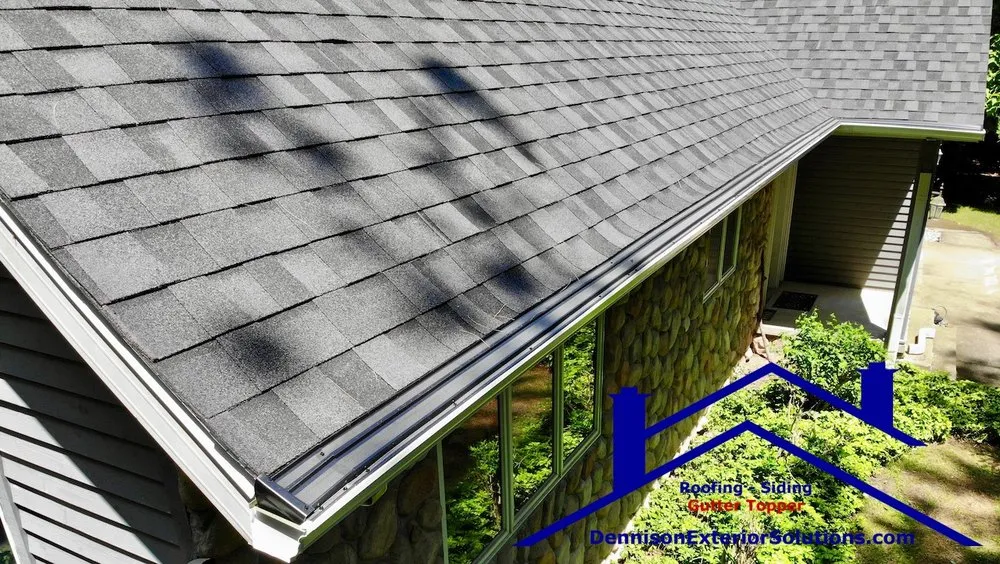 Slide of Dennison Roofing & Gutter Toppers
