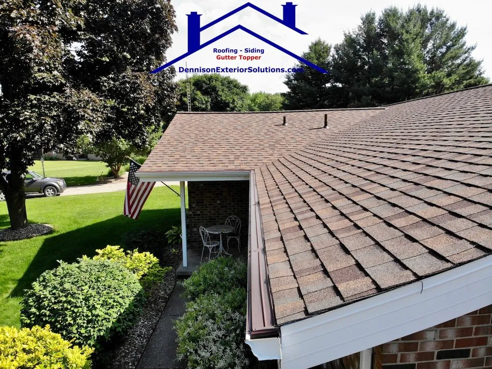 Slide of Dennison Roofing & Gutter Toppers