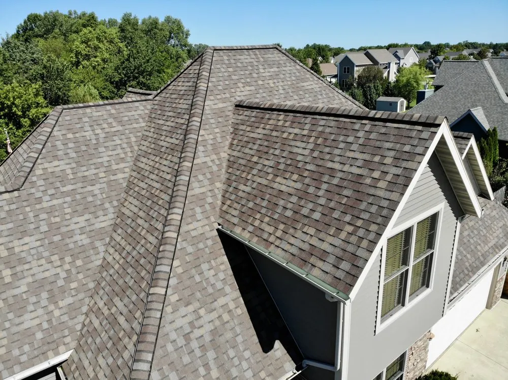 Slide of Dennison Roofing & Gutter Toppers