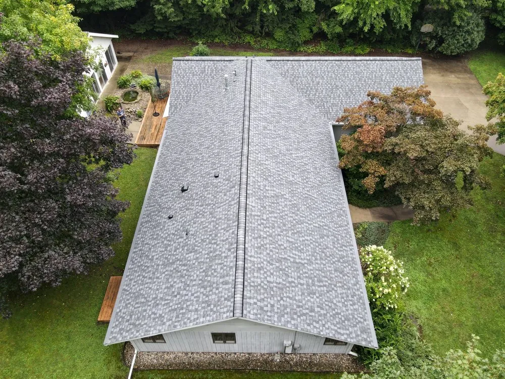 Slide of Dennison Roofing & Gutter Toppers