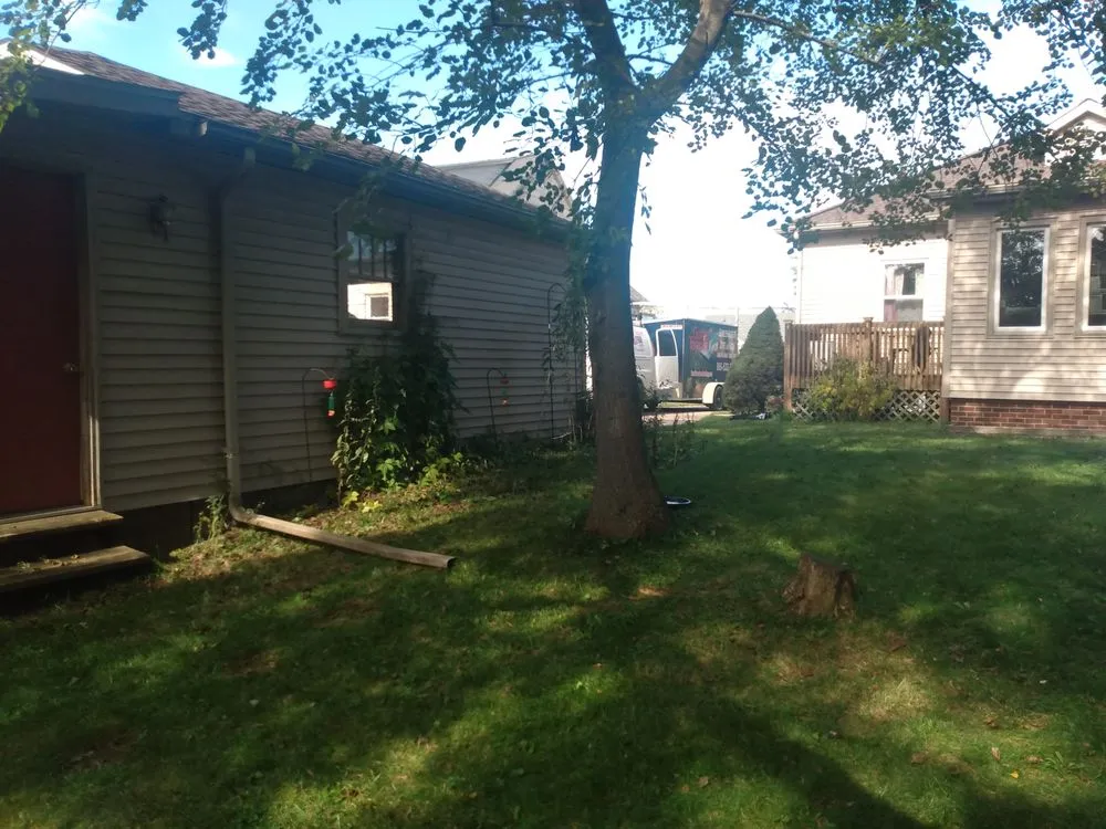 Slide of Dennison Roofing & Gutter Toppers