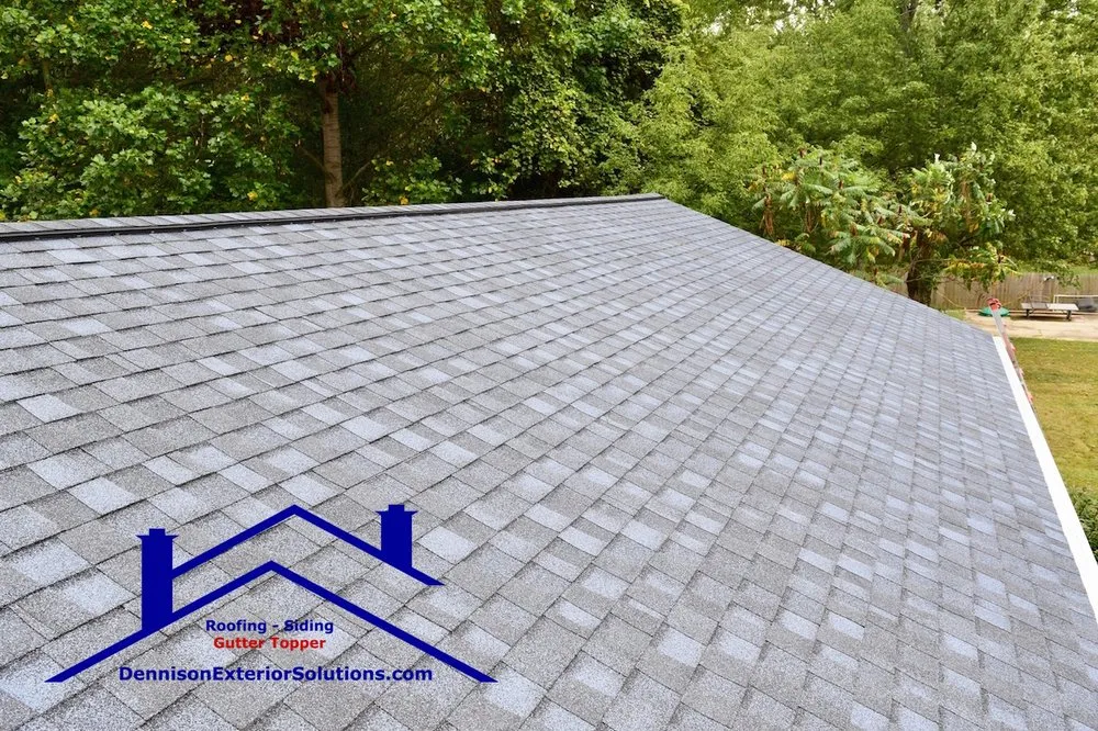 Slide of Dennison Roofing & Gutter Toppers