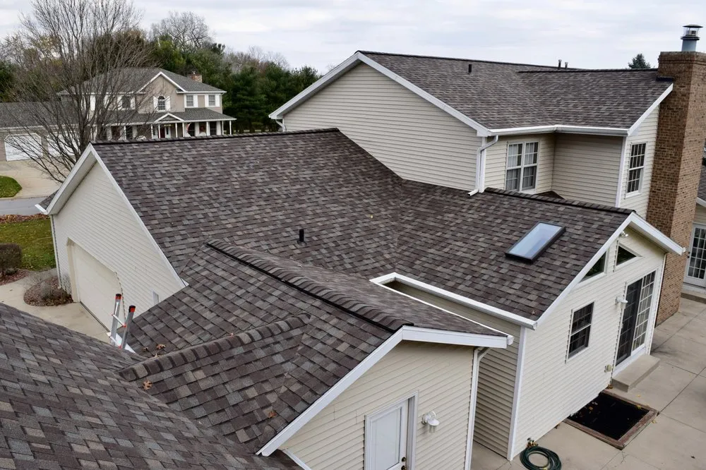 Slide of Dennison Roofing & Gutter Toppers