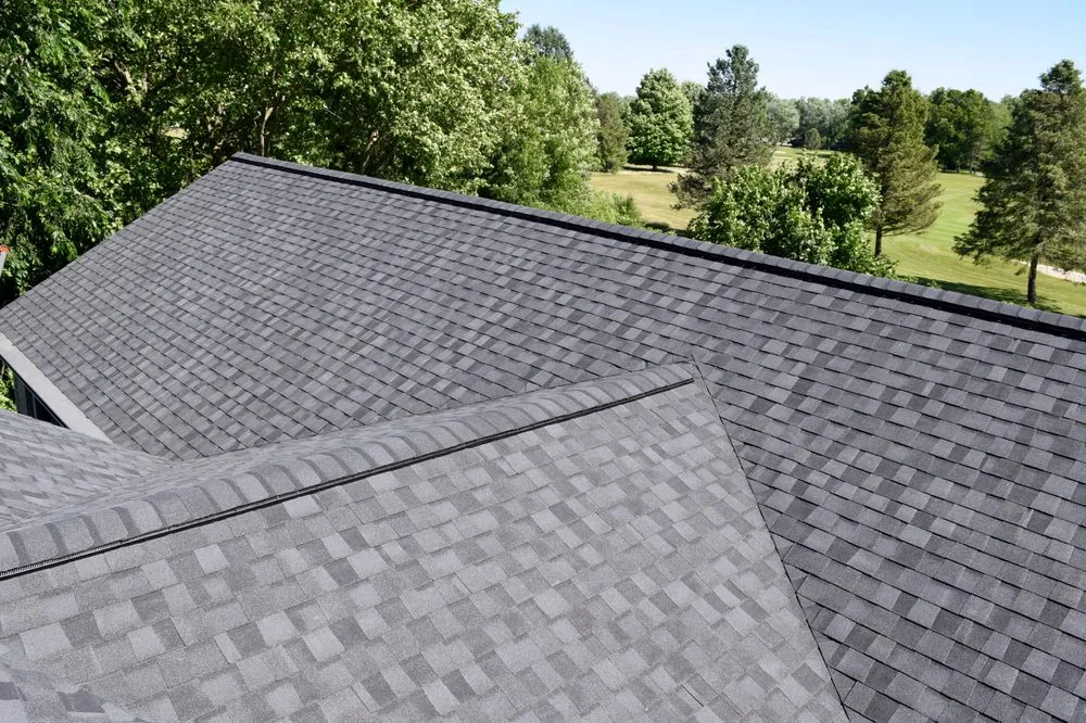 Slide of Dennison Roofing & Gutter Toppers