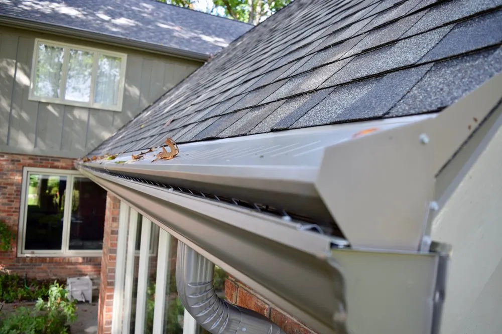 Slide of Dennison Roofing & Gutter Toppers