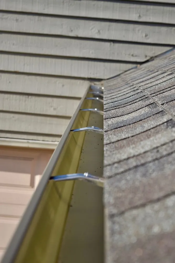 Slide of Dennison Roofing & Gutter Toppers