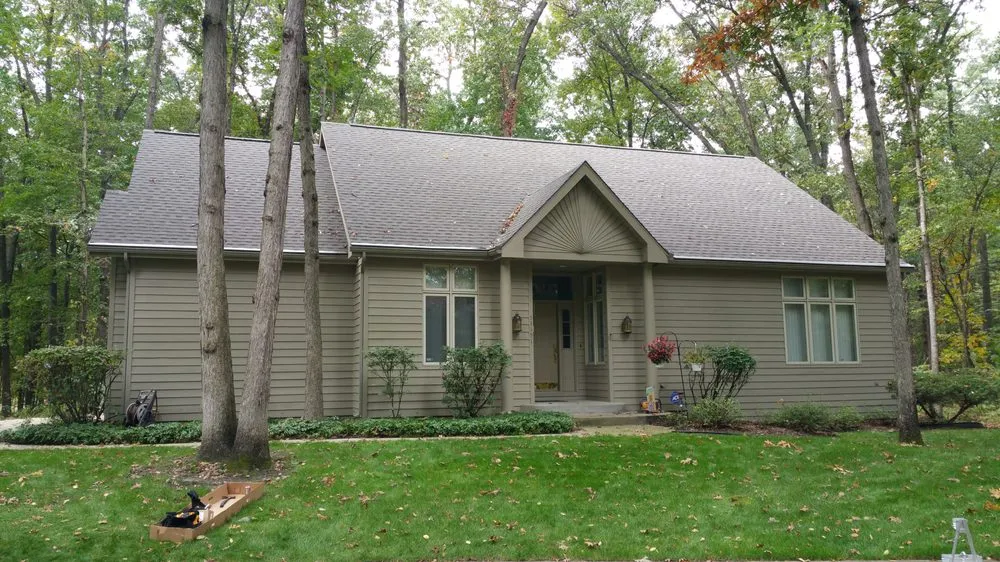 Slide of Dennison Roofing & Gutter Toppers