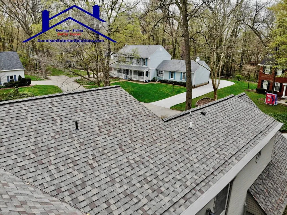 Slide of Dennison Roofing & Gutter Toppers