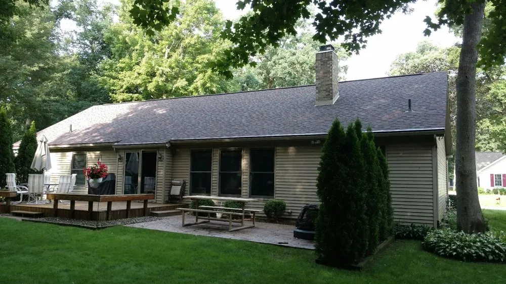 Slide of Dennison Roofing & Gutter Toppers