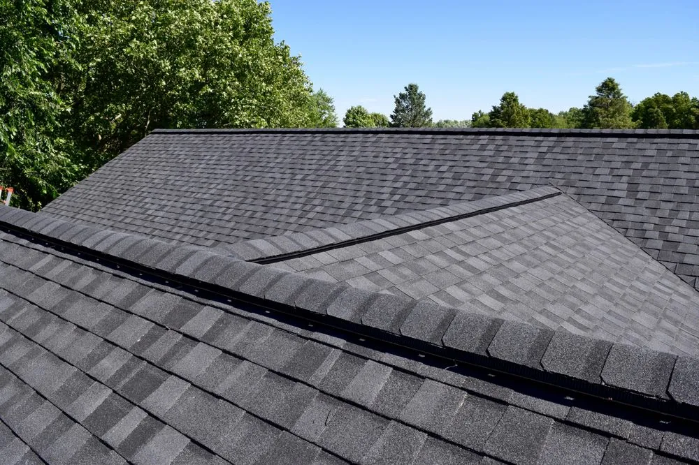 Slide of Dennison Roofing & Gutter Toppers