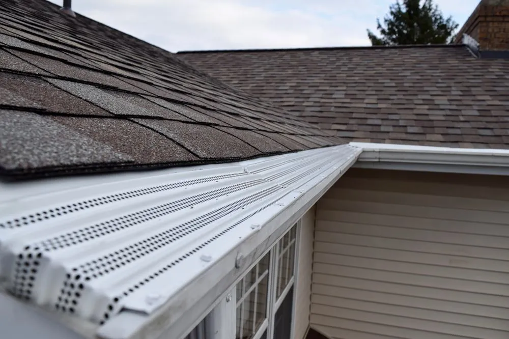 Slide of Dennison Roofing & Gutter Toppers