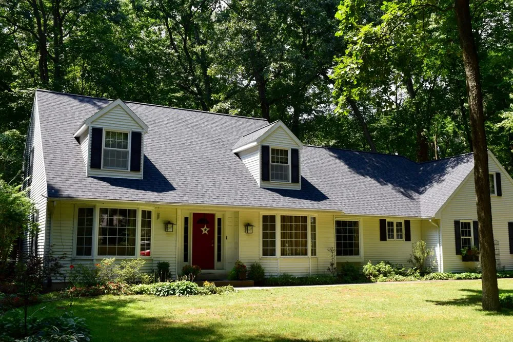 Slide of Dennison Roofing & Gutter Toppers