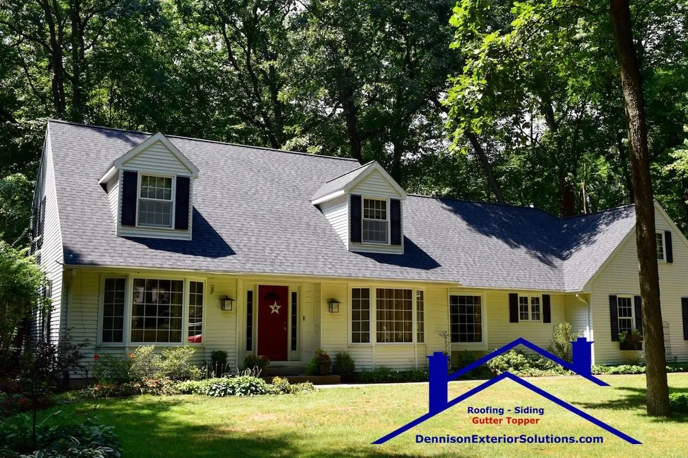 Slide of Dennison Roofing & Gutter Toppers