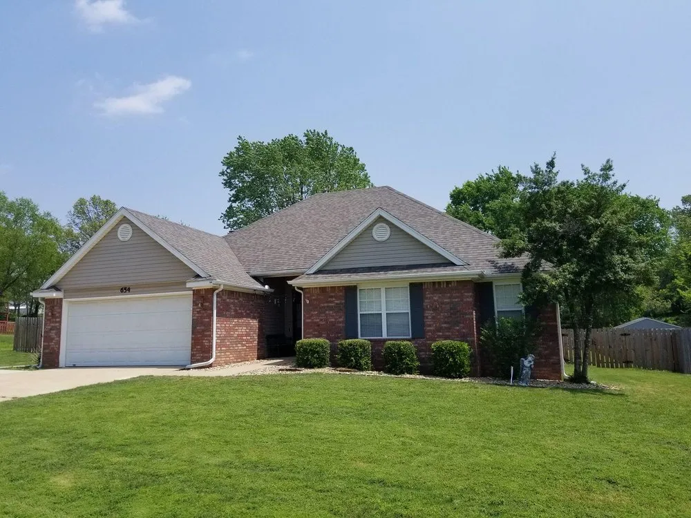 Slide of Denton's Roofing & Outdoor Solutions