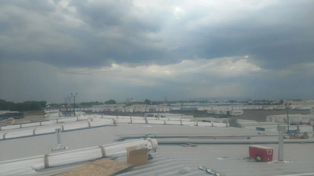 Slide of Denver Commercial Roofing Company