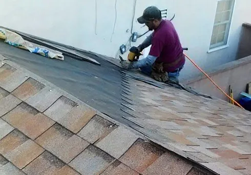 Slide of Denver Roofing Guys