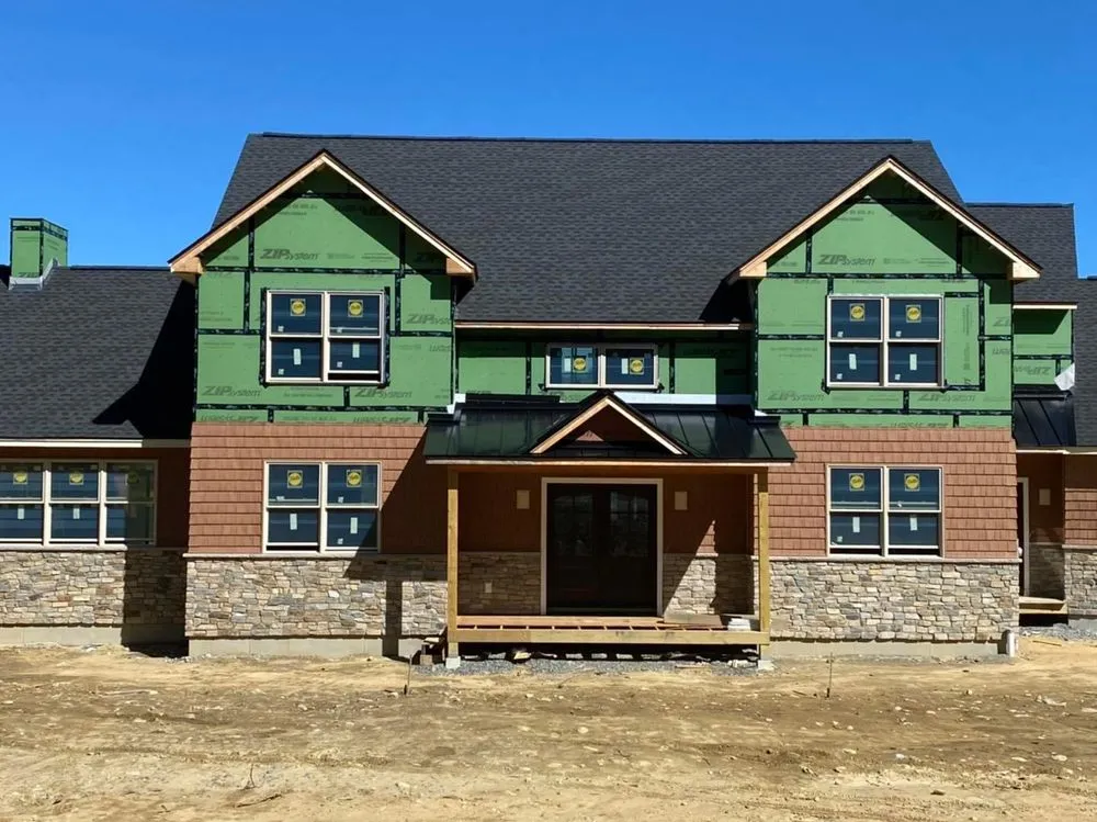 Slide of Derek Cook's Roofing Specialists