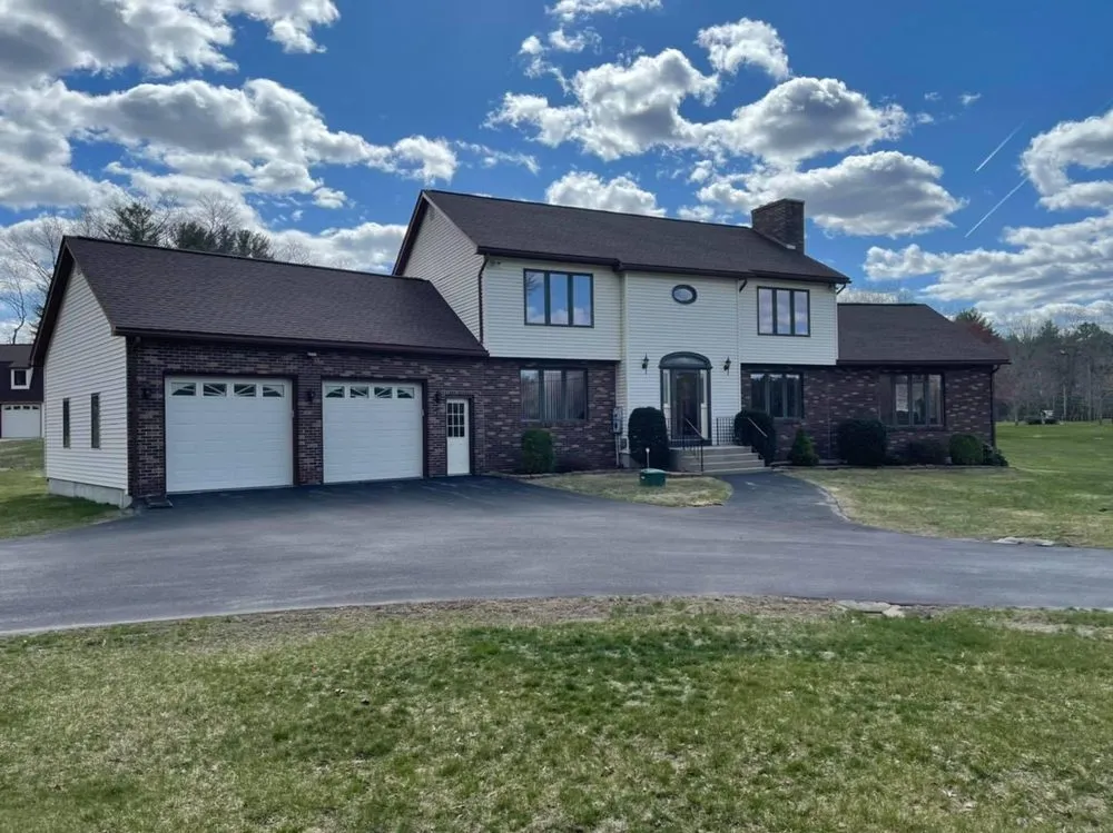 Slide of Derek Cook's Roofing Specialists