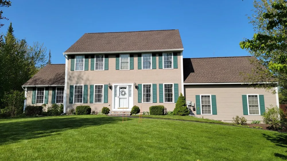 Slide of Derek Cook's Roofing Specialists