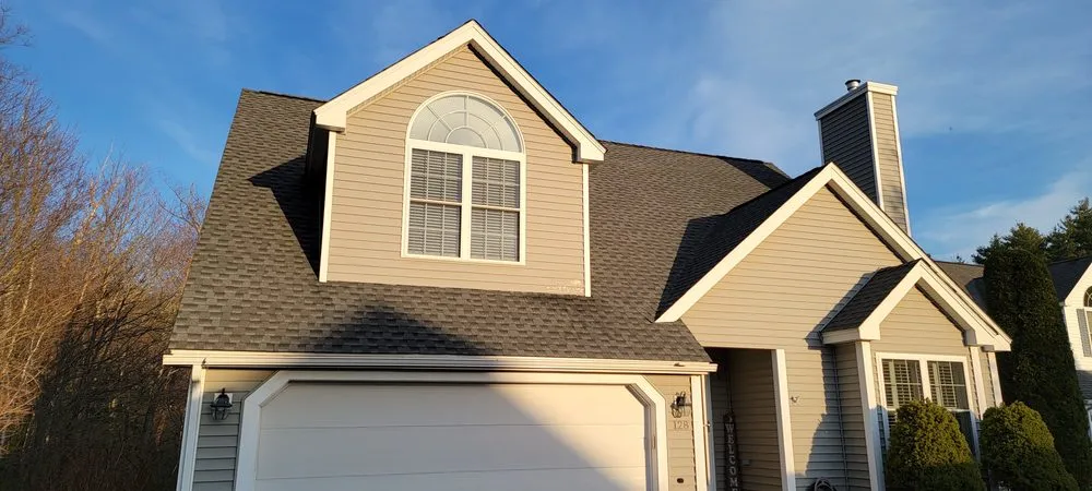 Slide of Derek Cook's Roofing Specialists