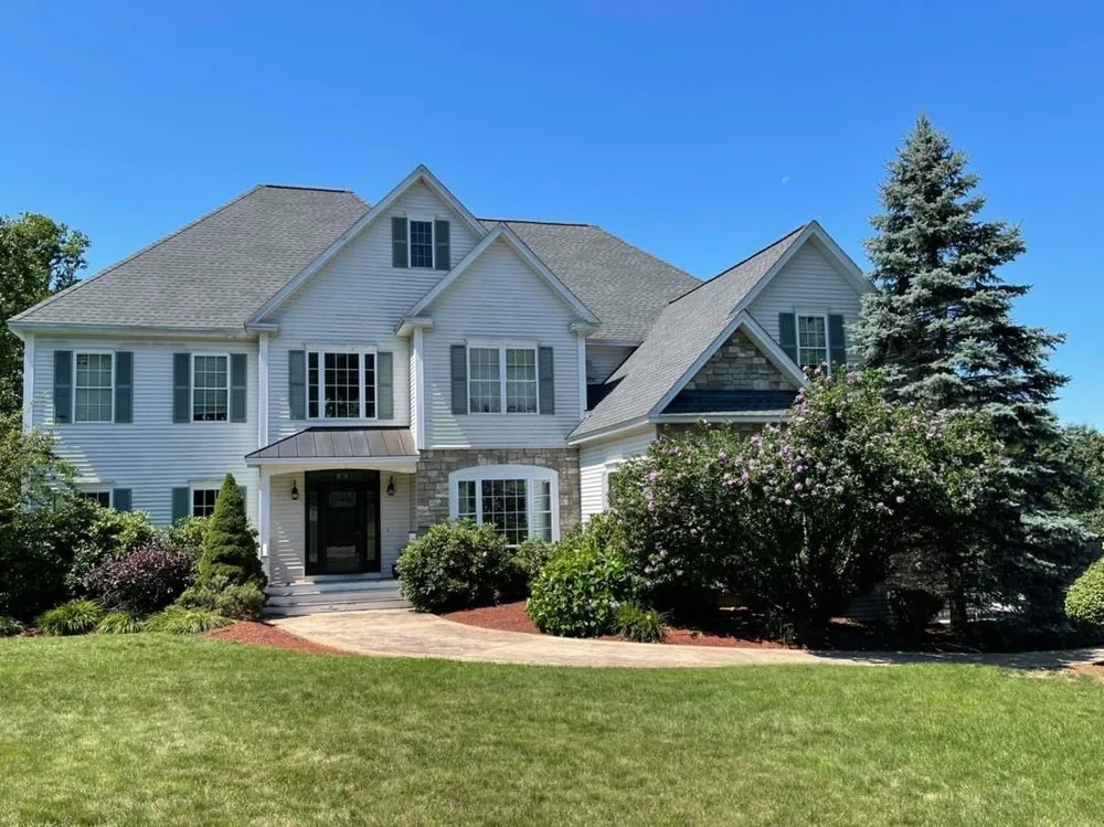 Slide of Derek Cook's Roofing Specialists