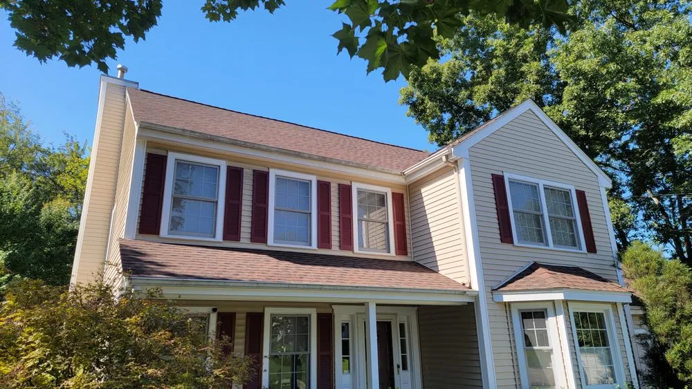 Slide of Derek Cook's Roofing Specialists