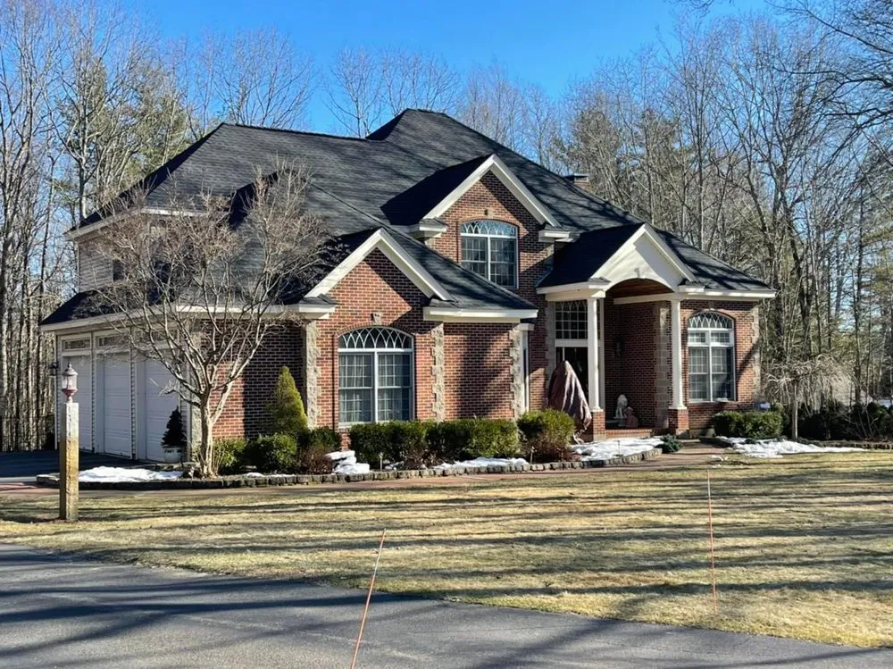 Slide of Derek Cook's Roofing Specialists