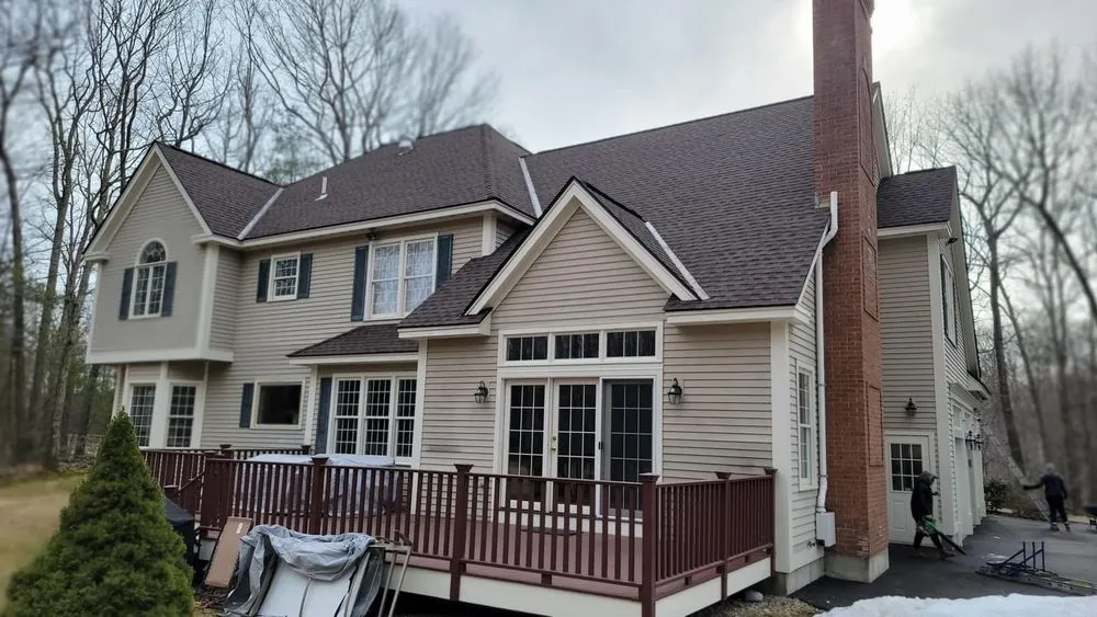 Slide of Derek Cook's Roofing Specialists