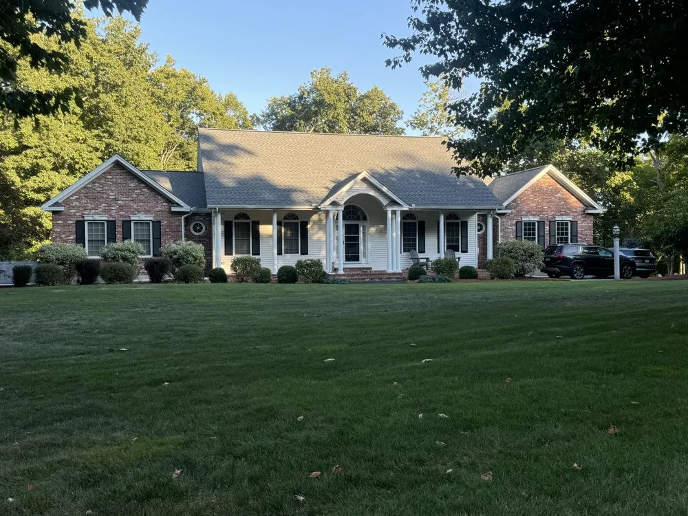 Slide of Derek Cook's Roofing Specialists