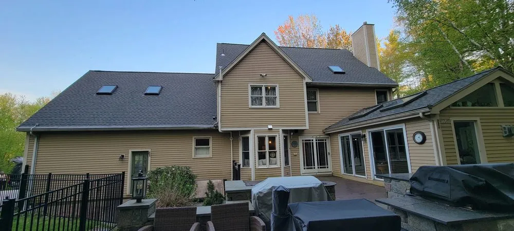 Slide of Derek Cook's Roofing Specialists