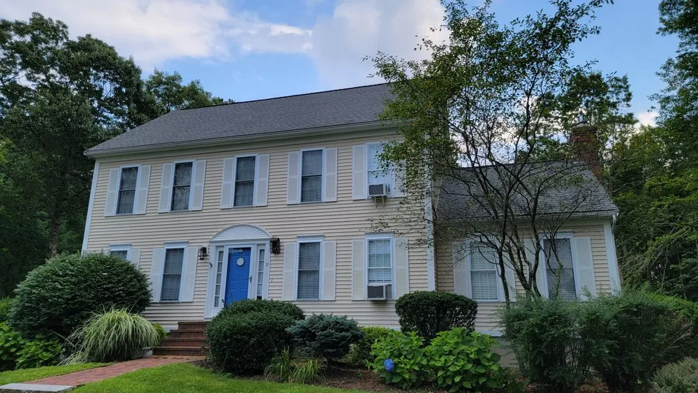 Slide of Derek Cook's Roofing Specialists