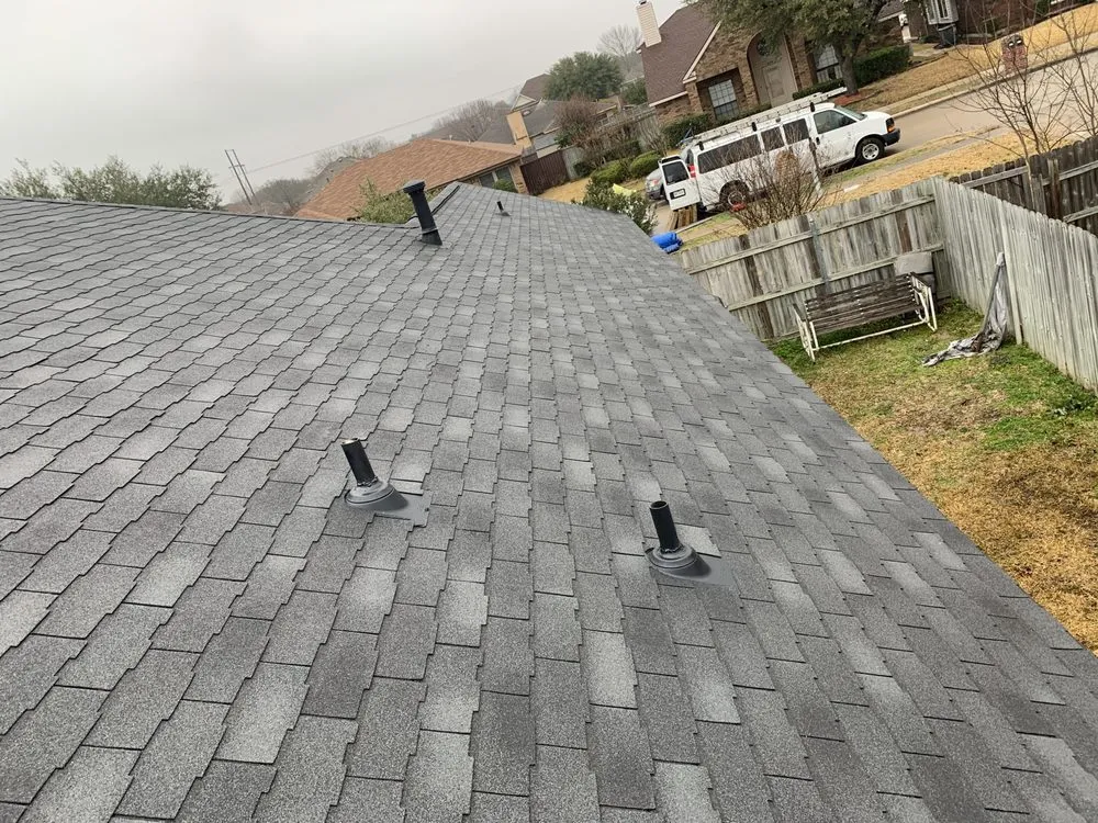 Slide of Design Roofing & General Contractors