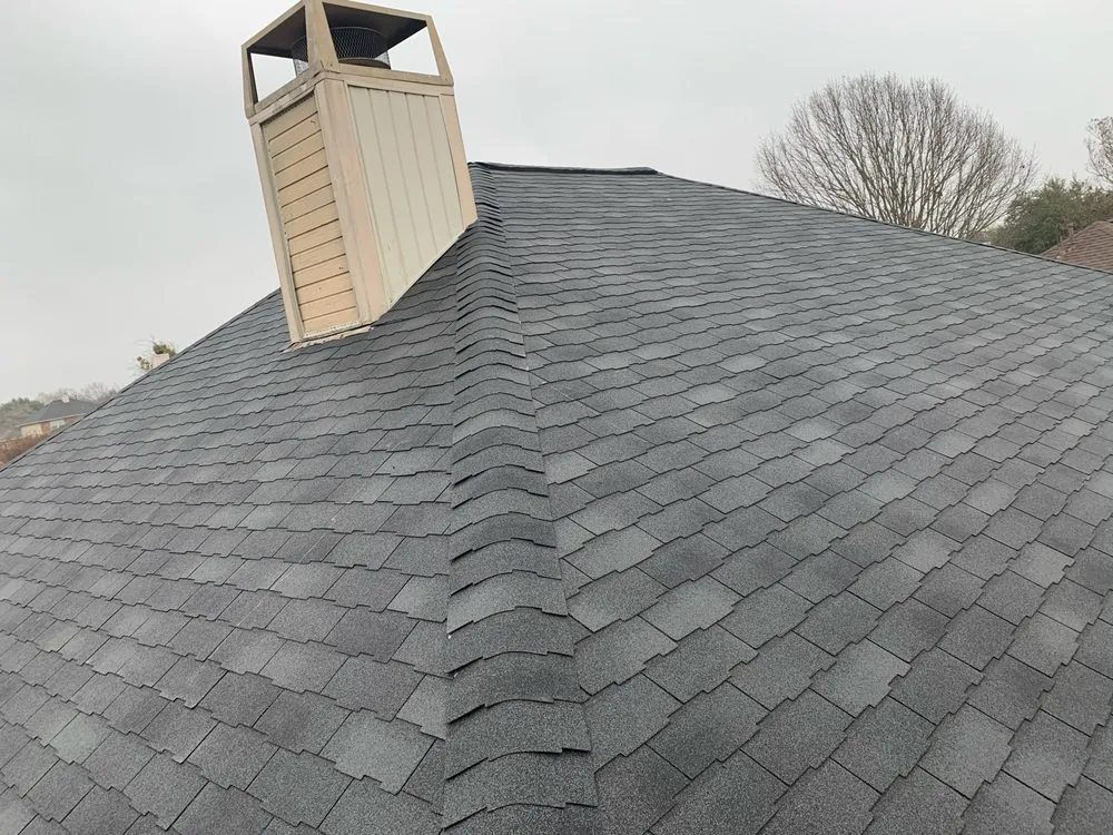 Slide of Design Roofing & General Contractors