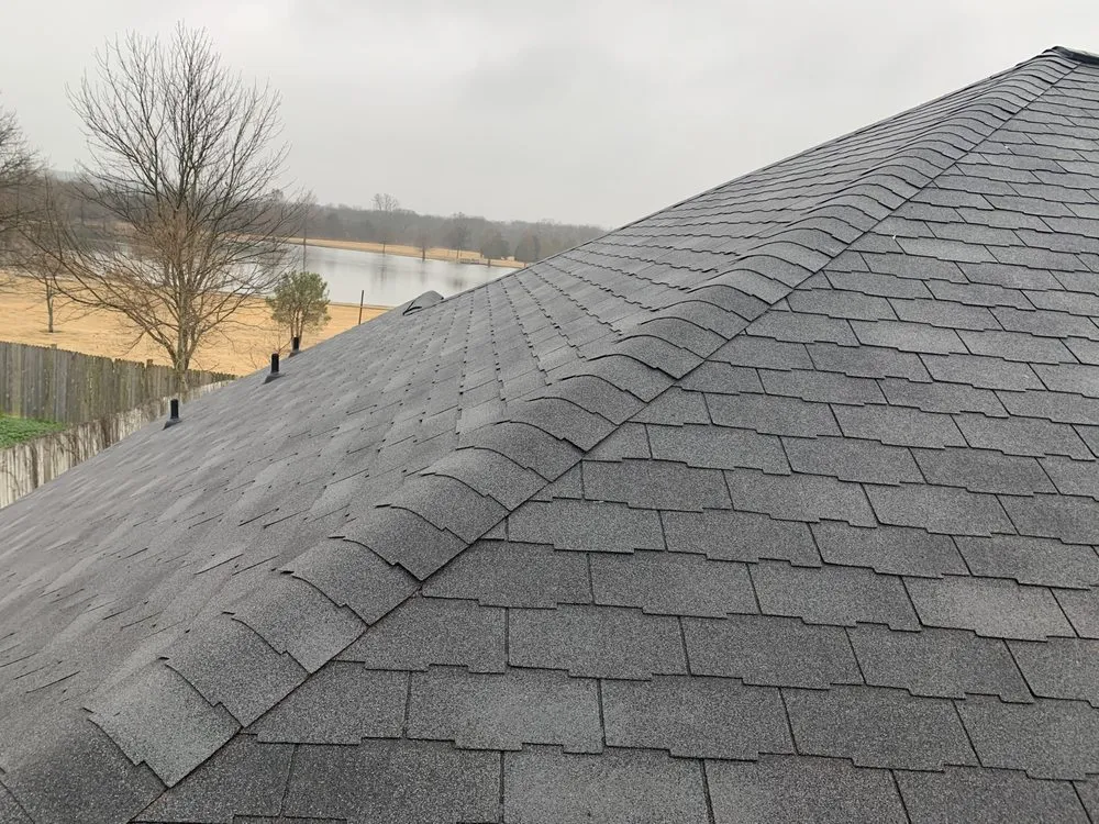 Slide of Design Roofing & General Contractors