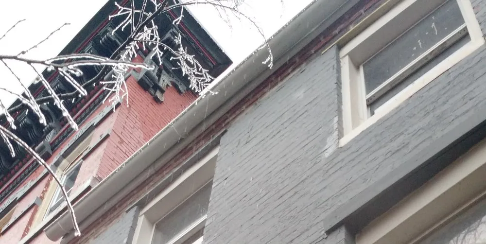 Slide of Devito Roofing Systems