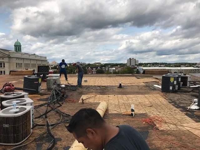 Slide of Devito Roofing Systems