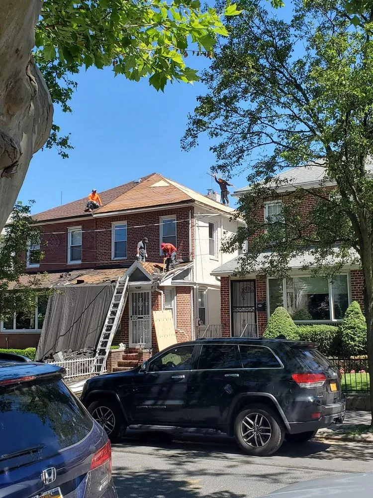 Slide of DF Empire Roofing & Construction