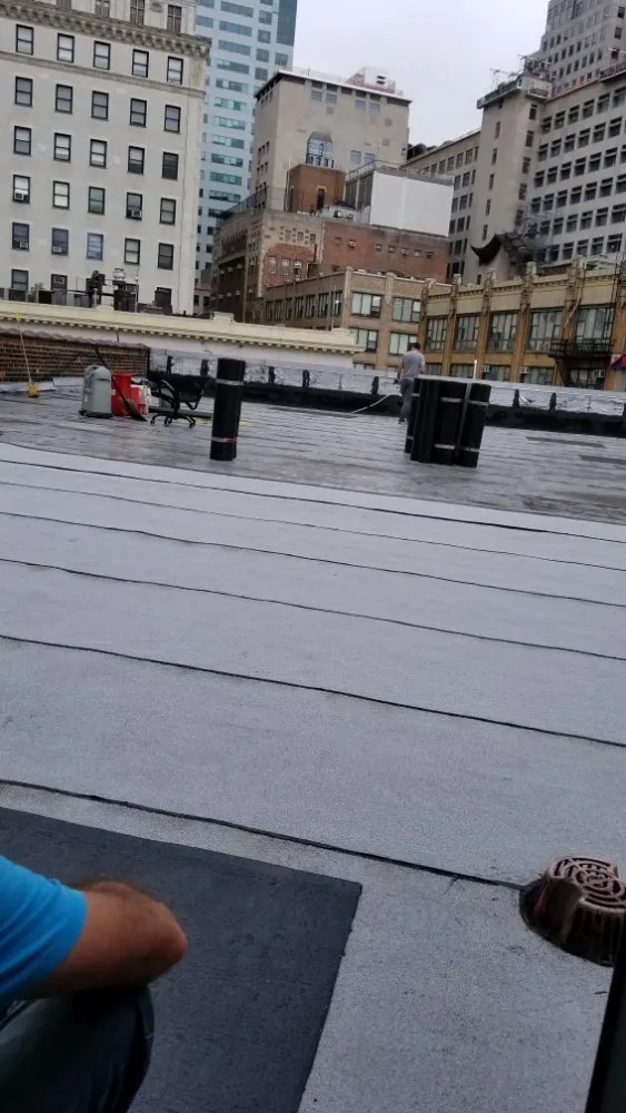 Slide of DF Empire Roofing & Construction