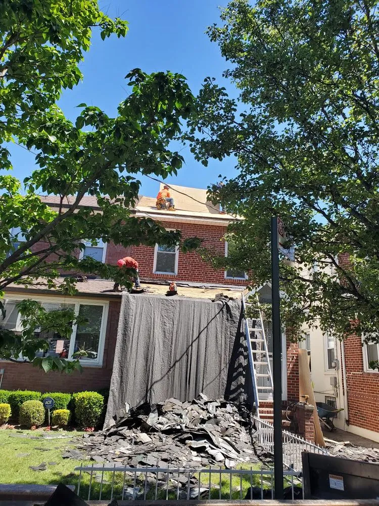 Slide of DF Empire Roofing & Construction