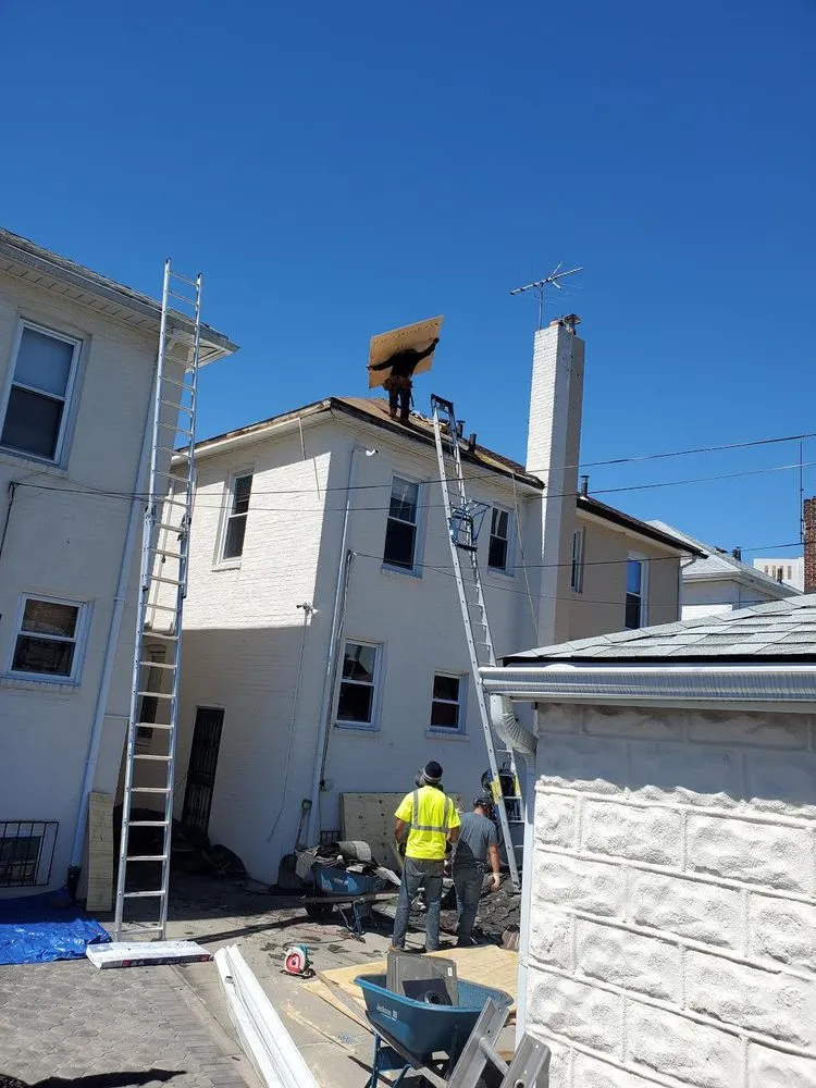 Slide of DF Empire Roofing & Construction