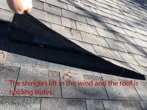 Slide of DFW Roof Pros