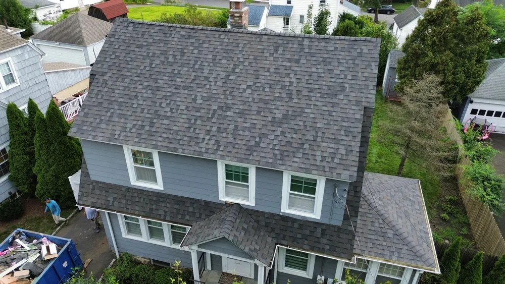 Slide of DG Roof Pros