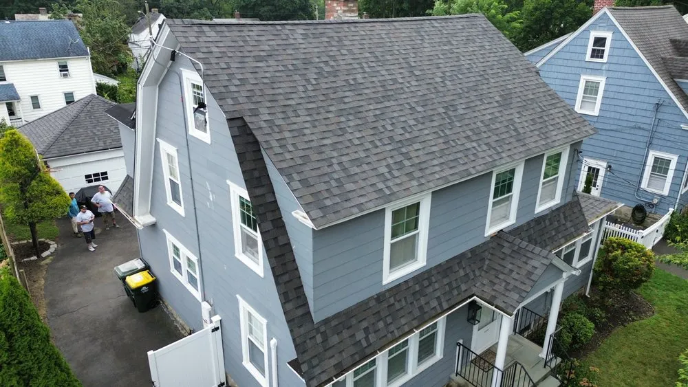 Slide of DG Roof Pros