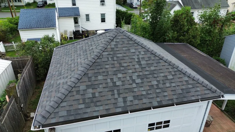 Slide of DG Roof Pros