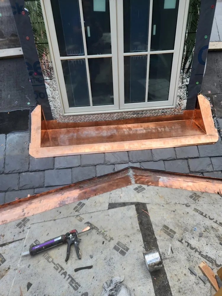 Slide of DGM Roofing