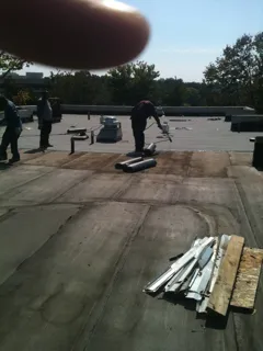 Slide of DHI Roofing Contractor