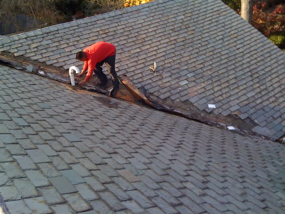 Slide of DHI Roofing Contractor