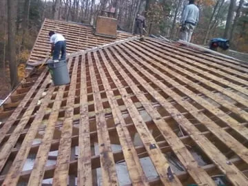 Slide of DHI Roofing Contractor